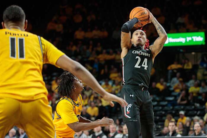 Jan 5, 2023; Wichita, Kansas, USA; Cincinnati Bearcats guard Jeremiah Davenport (24) puts up a shot during the first half against the Wichita State Shockers at Charles Koch Arena. Mandatory Credit: William Purnell-USA TODAY Sports